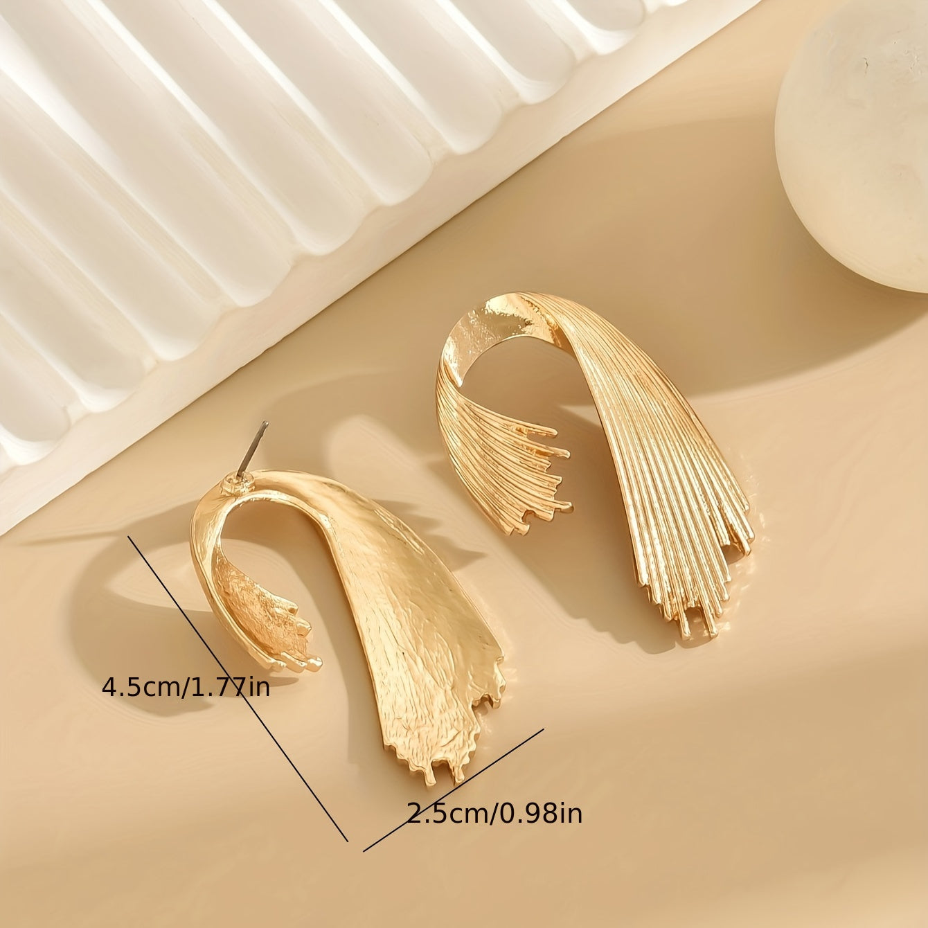 Boucles d'oreilles en forme créative