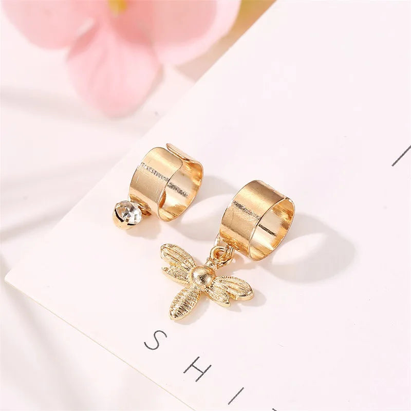 Boucles d'oreilles asymétriques de petite abeille et Zircon