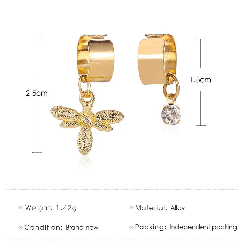 Boucles d'oreilles asymétriques de petite abeille et Zircon