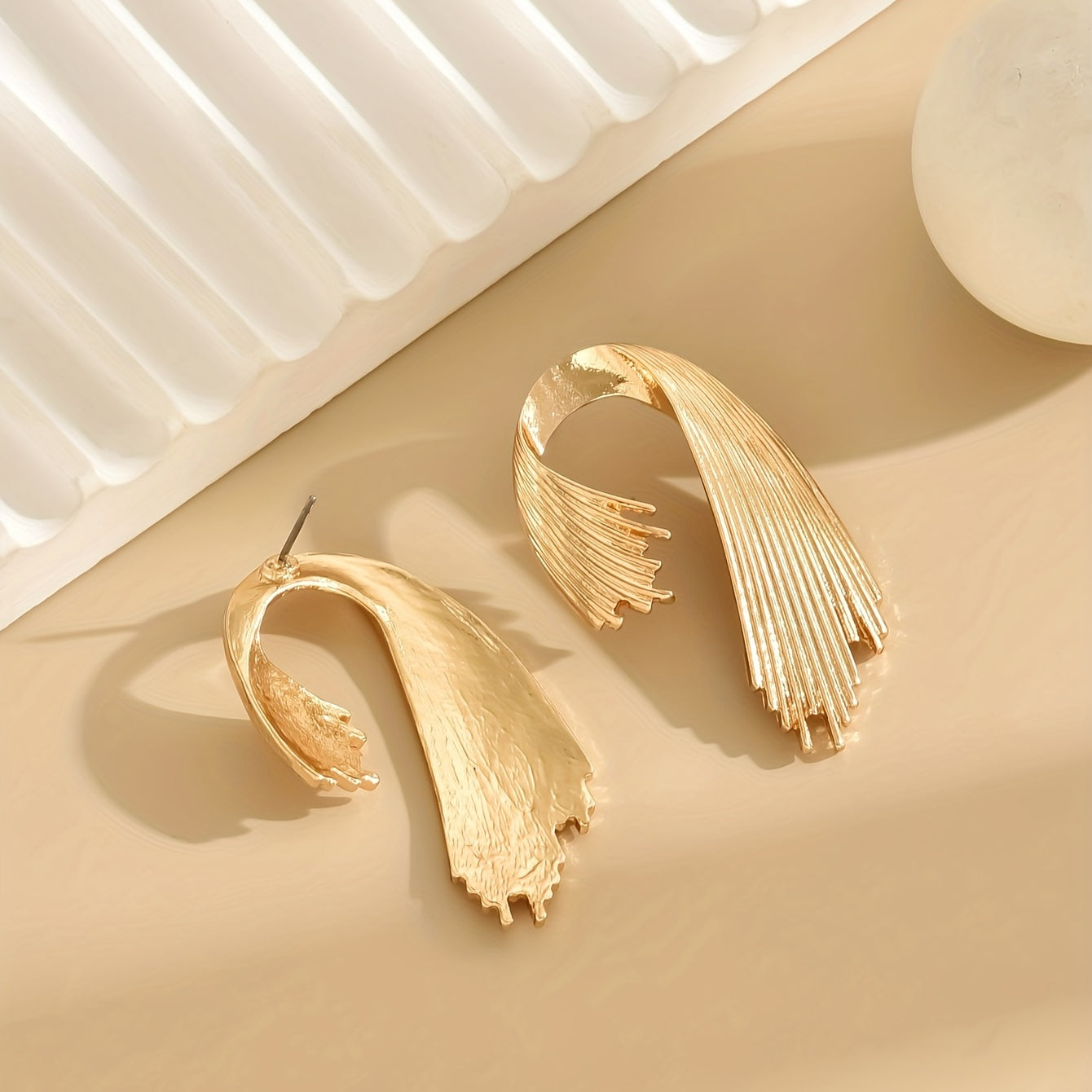 Boucles d'oreilles en forme créative